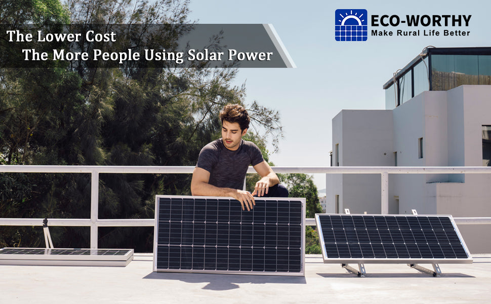 Man installing solar panels outdoors.